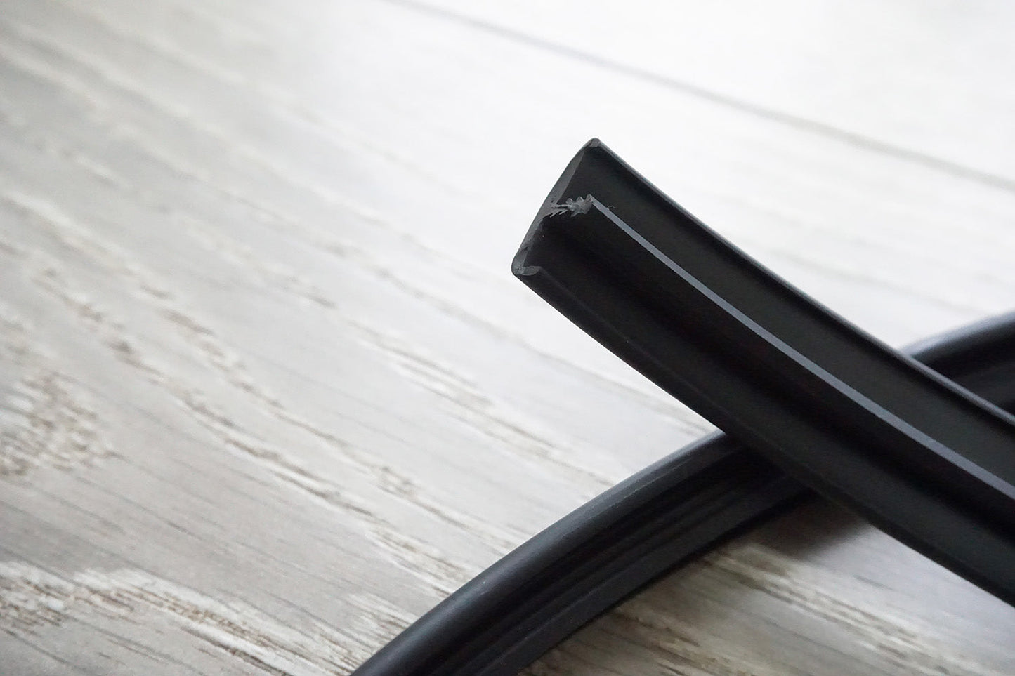 Custom Length - Double Lipped black T-Trim - 15MM