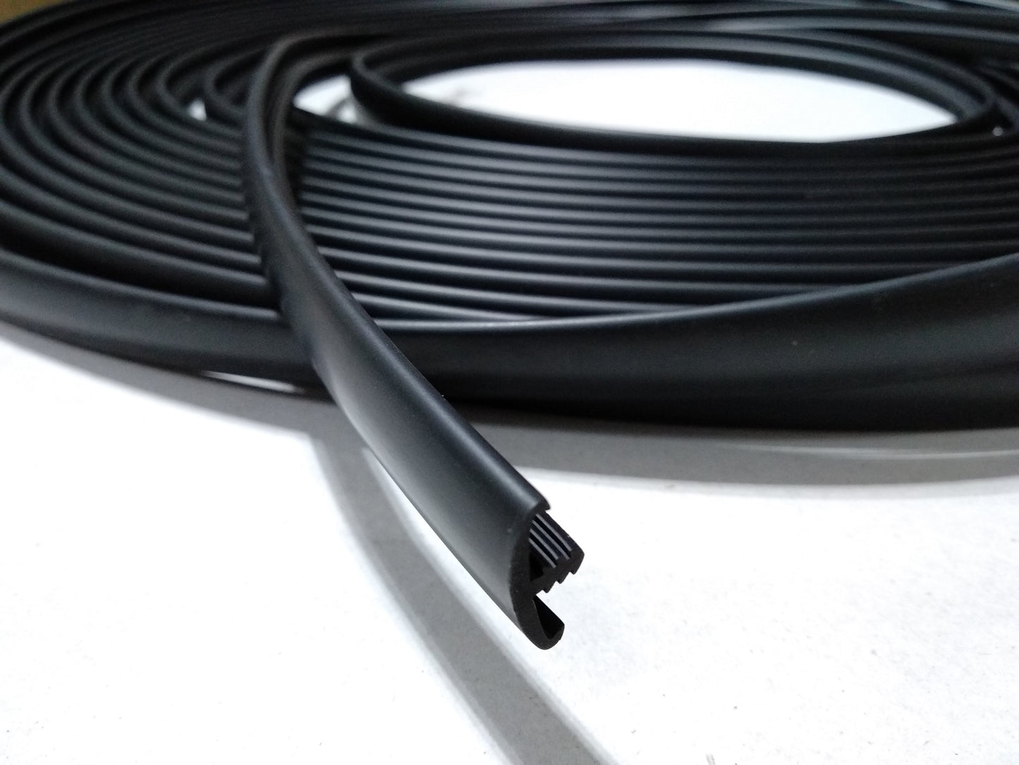 Custom Length - Double Lipped black T-Trim - 15MM